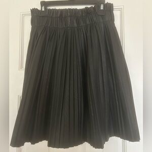 Black pleated leather mini skirt